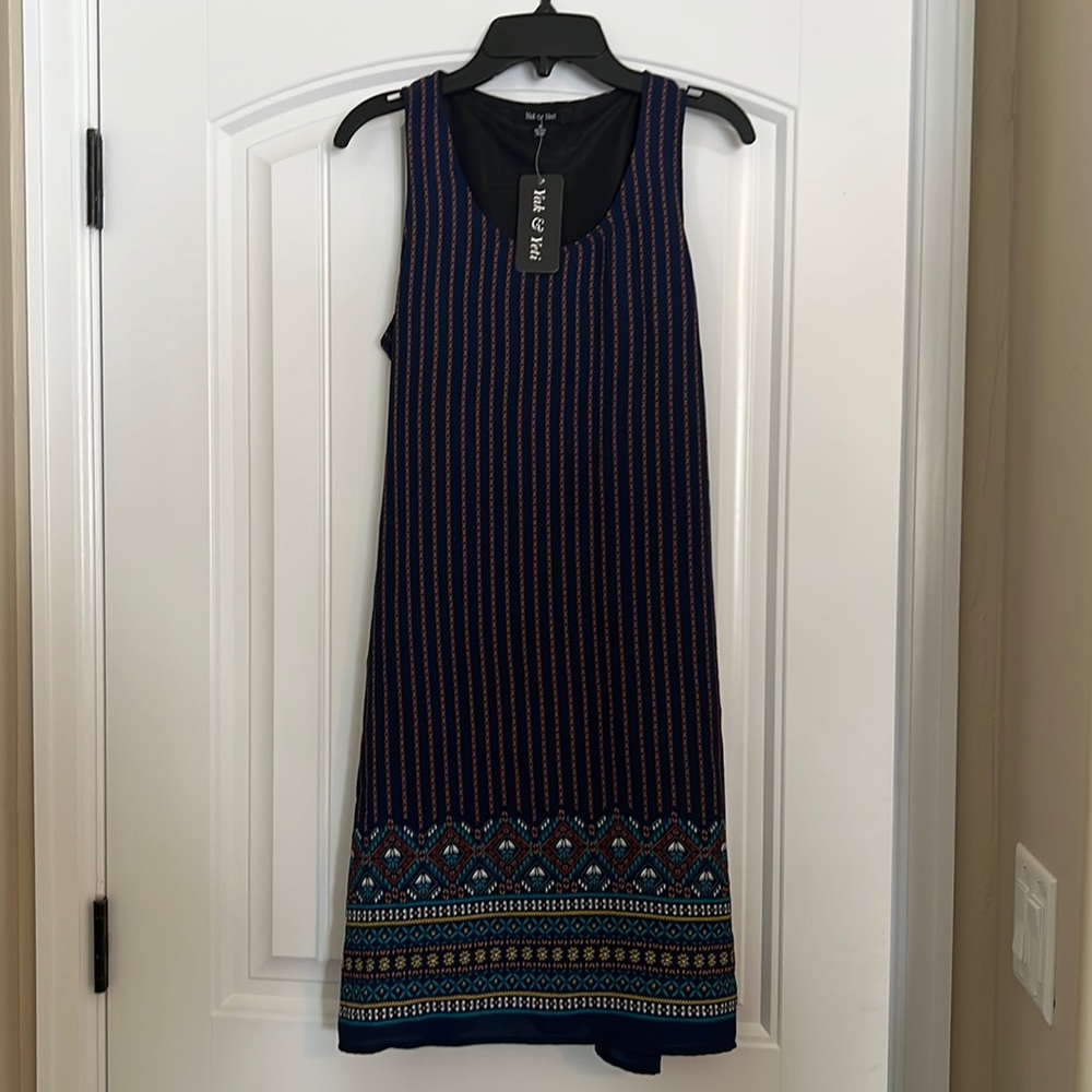 yak and yeti brand, size small, navy with rust ,turquoise, mustard pattern.